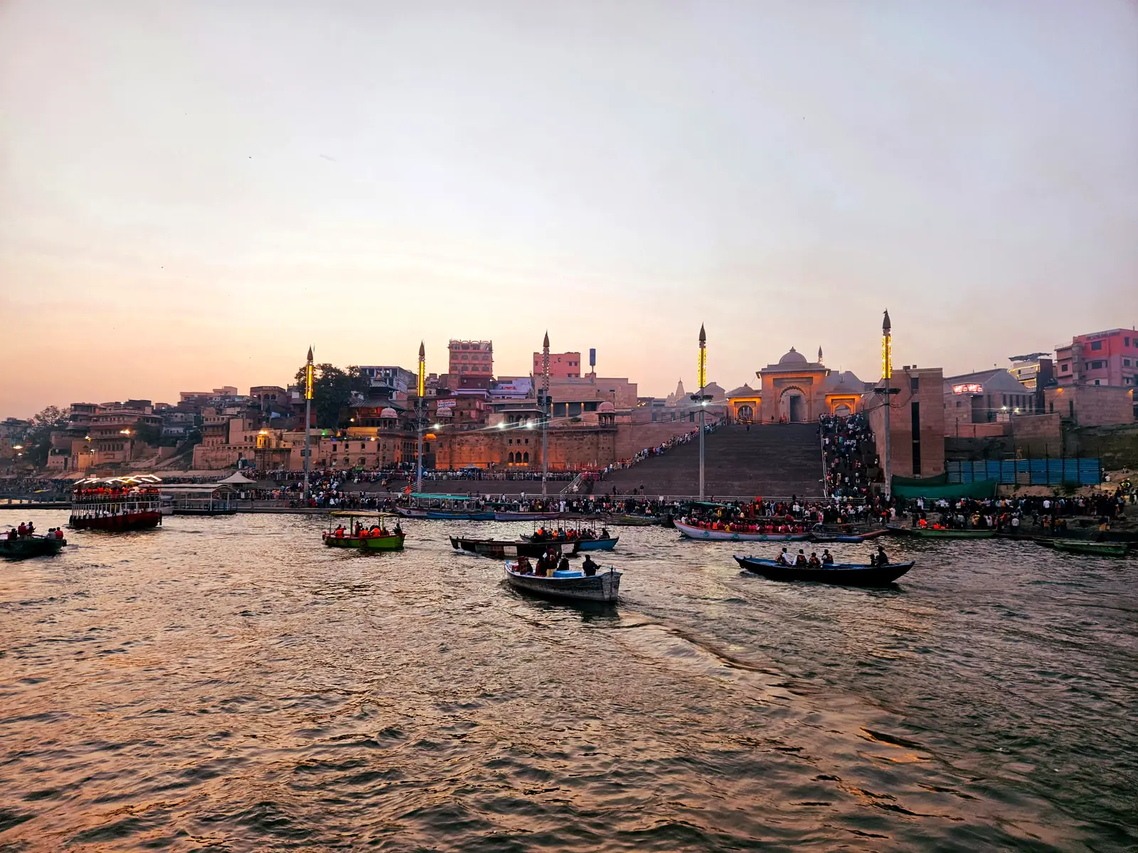 Kashi Vishwanath Corridor with Ganga ghats at sunset and boats, Varanasi